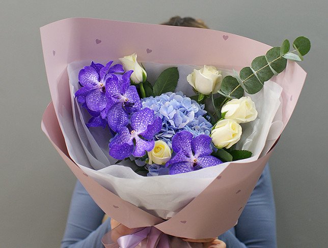 Bouquet with blue hydrangea and vanda orchid photo