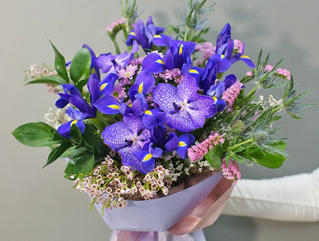 Bouquet of purple irises and chrysanthemums photo