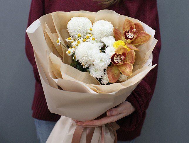 Complimentary bouquet of white chrysanthemums and orchids photo