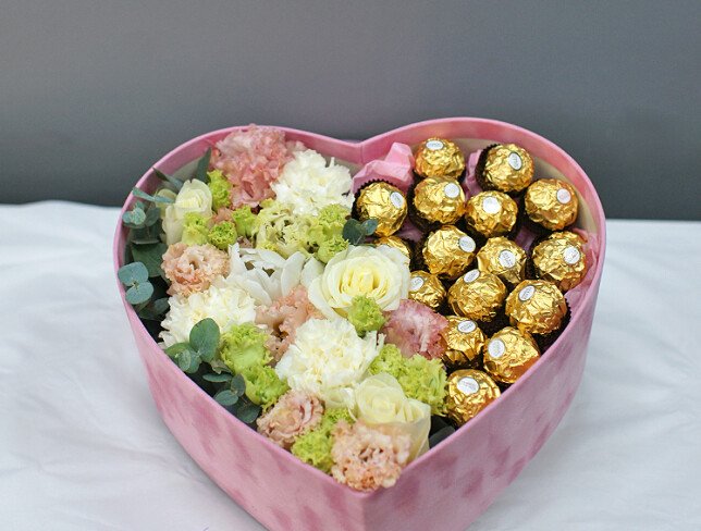 Pink velvet box with eustoma and Ferrero Rocher photo