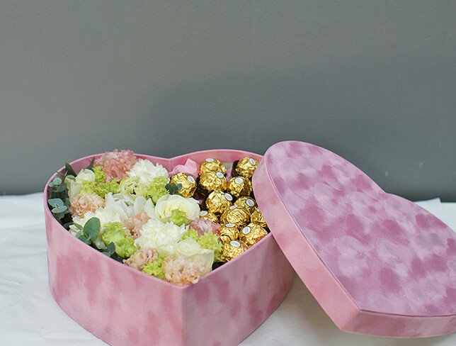 Pink velvet box with eustoma and Ferrero Rocher photo