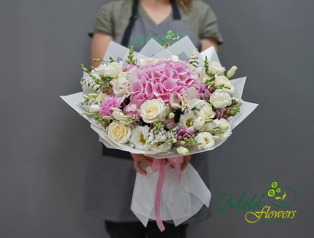 Bouquet with pink hydrangea, white roses, and orchid photo