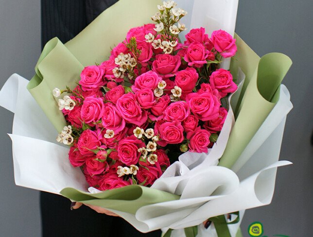 Exquisite bouquet of fuchsia bush roses photo