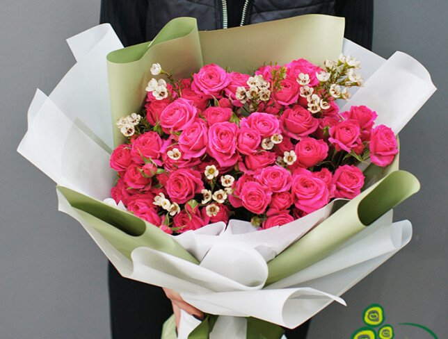 Exquisite bouquet of fuchsia bush roses photo