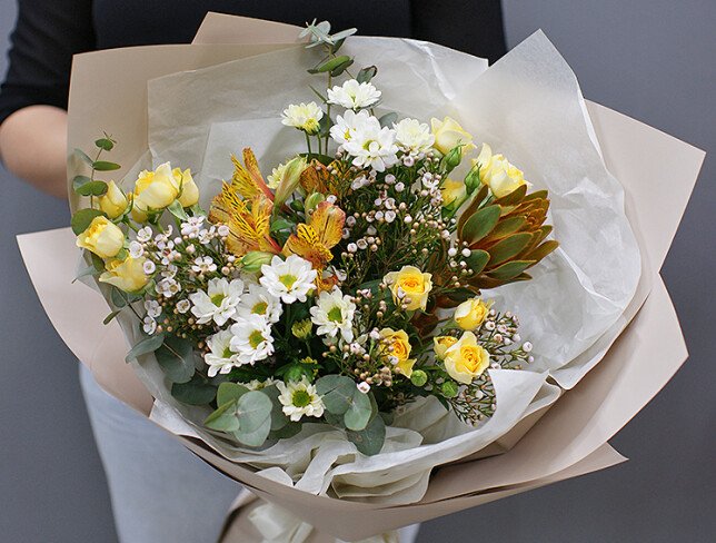 Bouquet of bush yellow roses and chrysanthemums