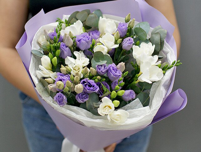 Bouquet of purple lisianthus and white freesias photo