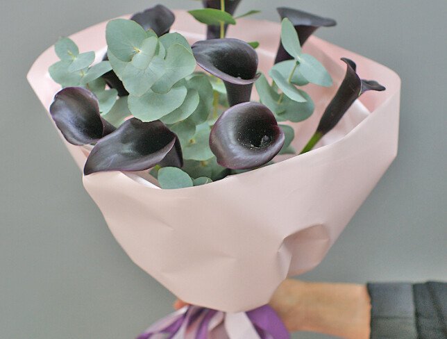 Bouquet with black calla lilies and eucalyptus photo
