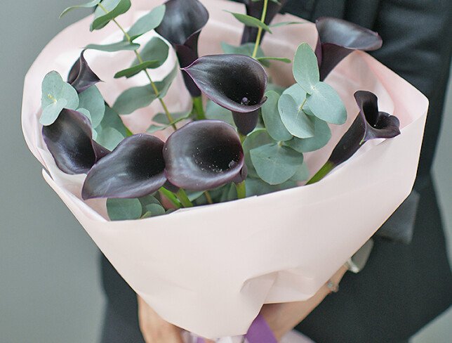Bouquet with black calla lilies and eucalyptus photo