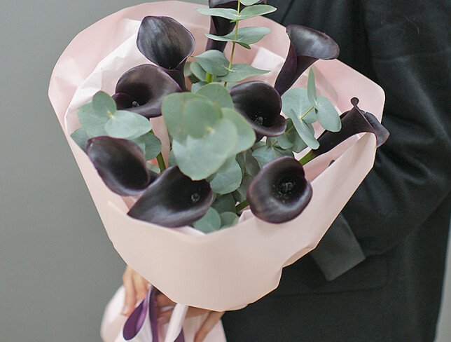 Bouquet with black calla lilies and eucalyptus photo