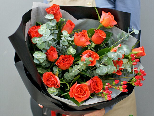 Bouquet of orange roses with eucalyptus photo