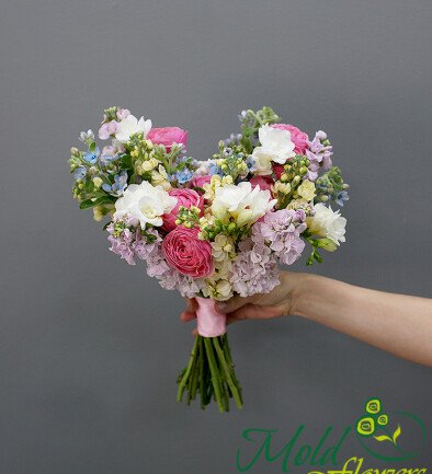 Bridal bouquet of peony-shaped roses, freesias, oxypetalum, and matthiola photo 394x433