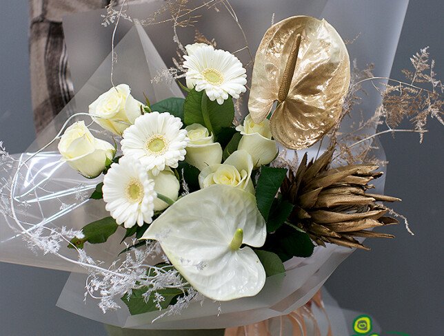 Bouquet of anthurium, protea and gerbera "Sands of Sahara" photo