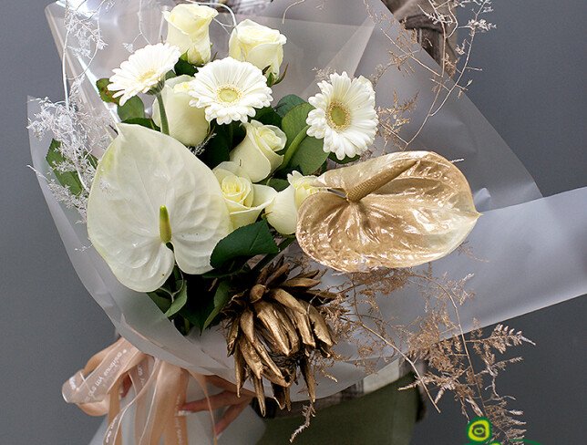Bouquet of anthurium, protea and gerbera "Sands of Sahara" photo