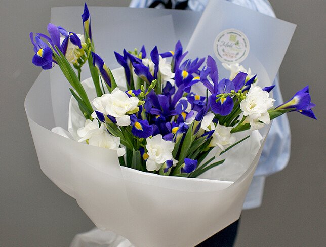 Bouquet of purple irises and white freesias photo
