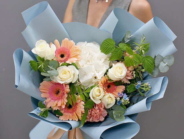 Bouquet of white hydrangea and pale pink gerberas photo