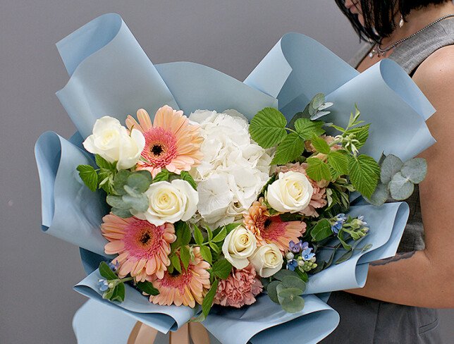 Bouquet of white hydrangea and pale pink gerberas photo