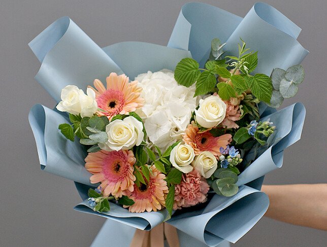 Bouquet of white hydrangea and pale pink gerberas photo
