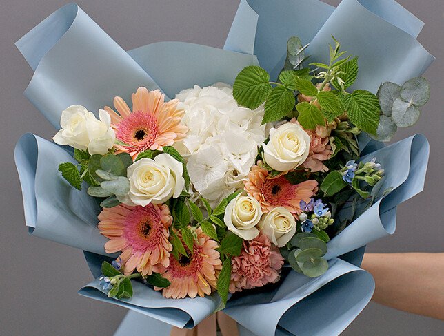 Bouquet of white hydrangea and pale pink gerberas photo