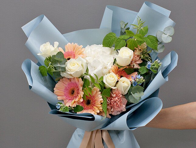 Bouquet of white hydrangea and pale pink gerberas photo