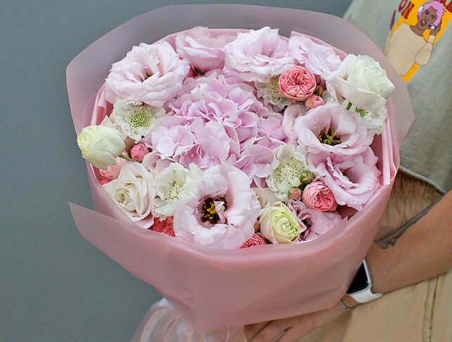 Bouquet of pink hydrangea, roses and eustoma photo