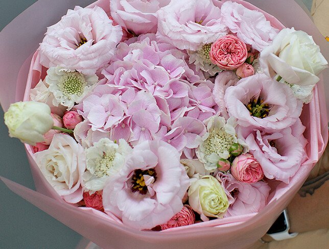Bouquet of pink hydrangea, roses and eustoma photo