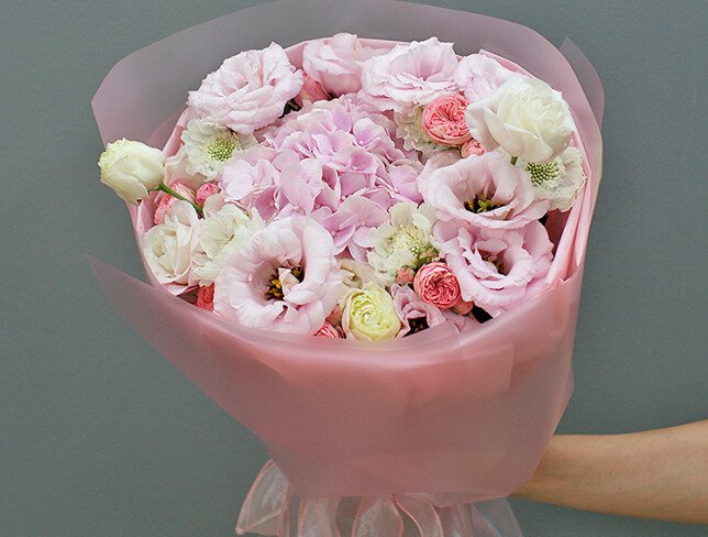 Bouquet of pink hydrangea, roses and eustoma photo