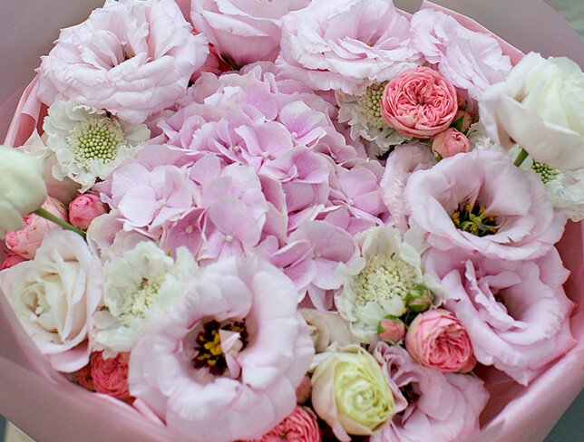 Bouquet of pink hydrangea, roses and eustoma photo