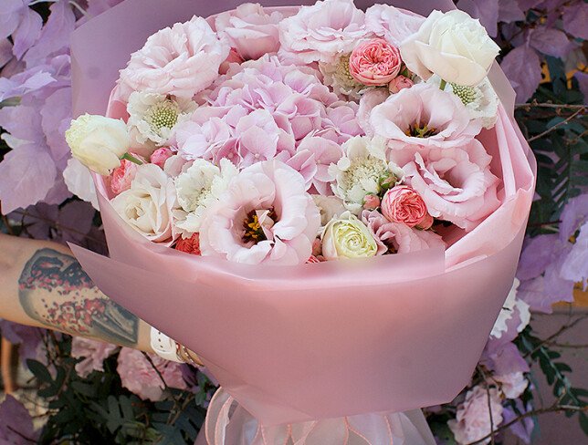 Bouquet of pink hydrangea, roses and eustoma photo