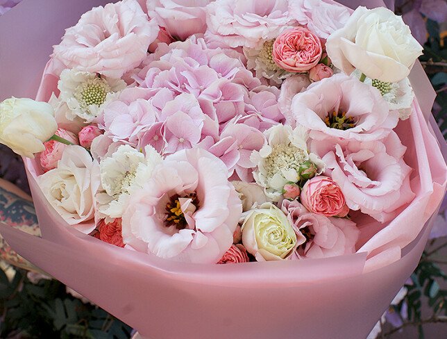 Bouquet of pink hydrangea, roses and eustoma photo