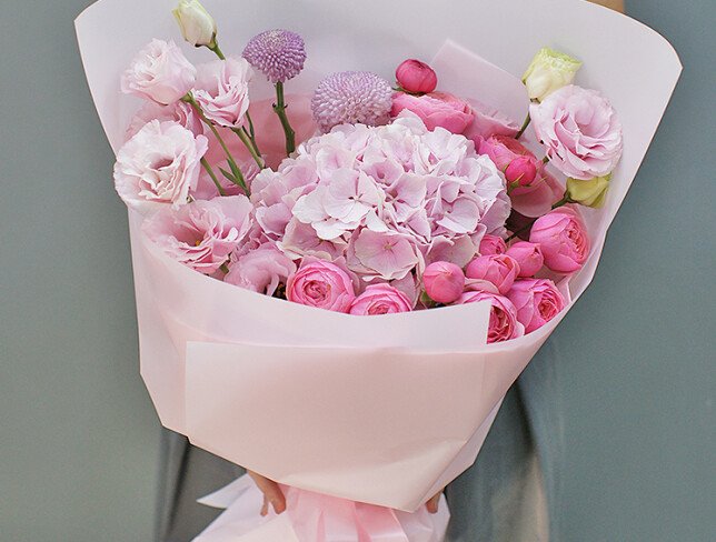 Bouquet of pink hydrangea, pink garden roses and lisianthus photo