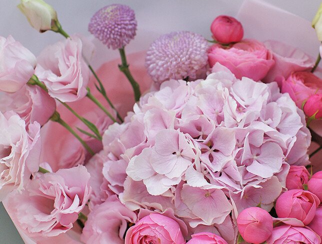 Bouquet of pink hydrangea, pink garden roses and lisianthus photo