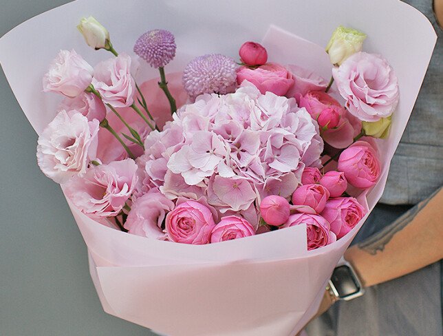 Bouquet of pink hydrangea, pink garden roses and lisianthus photo