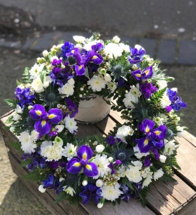 Funeral wreath of purple irises and white chrysanthemums (d=46) photo 394x433