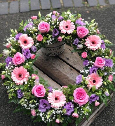 Funeral wreath of gerberas, eustomas and roses (d=46) photo 394x433