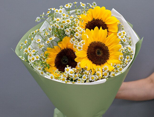Bouquet of sunflowers and daisies photo