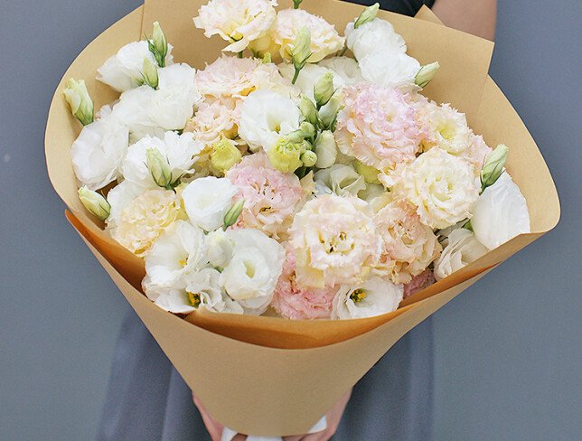 Bouquet of white and cream eustoma in crafts photo