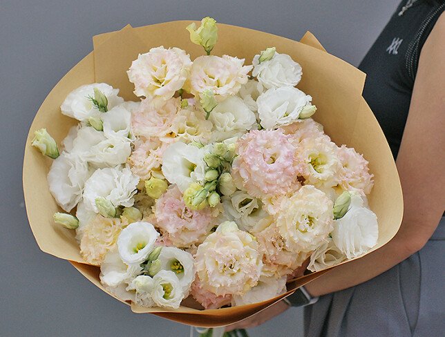 Bouquet of white and cream eustoma in crafts photo