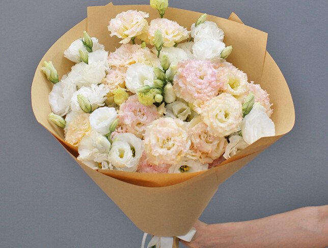 Bouquet of white and cream eustoma in crafts photo