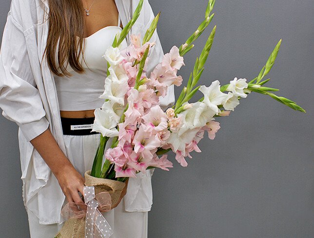 Bouquet of pink and white gladiolus photo