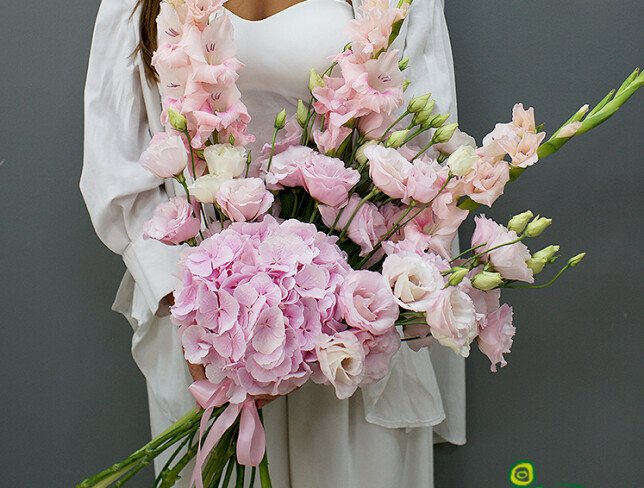Bouquet with hydrangea, lisianthus, and pink gladiolus photo