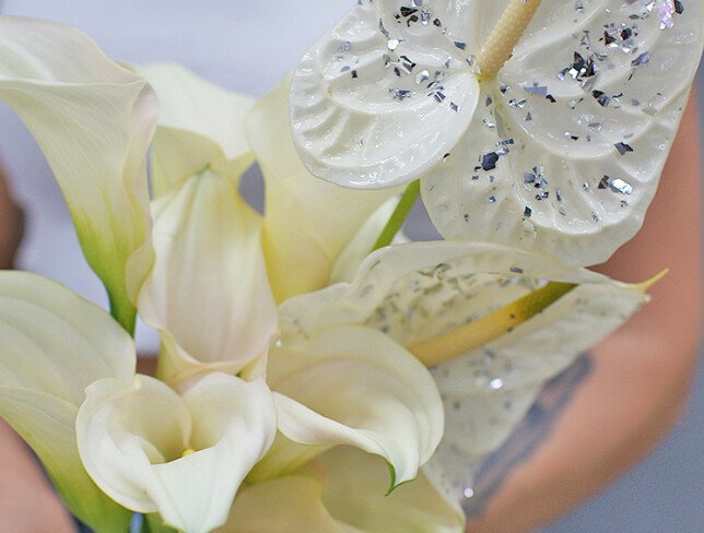 Bridal bouquet of white calla lilies and anthurium photo