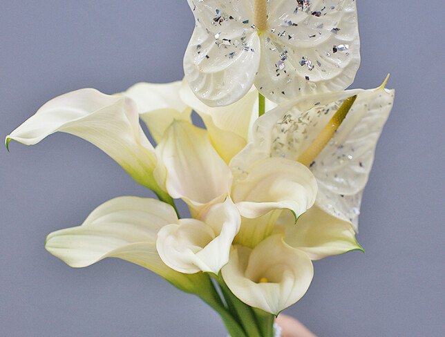 Bridal bouquet of white calla lilies and anthurium photo