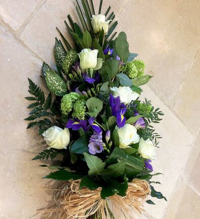 Funeral bouquet with roses, irises and chrysanthemums photo 394x433