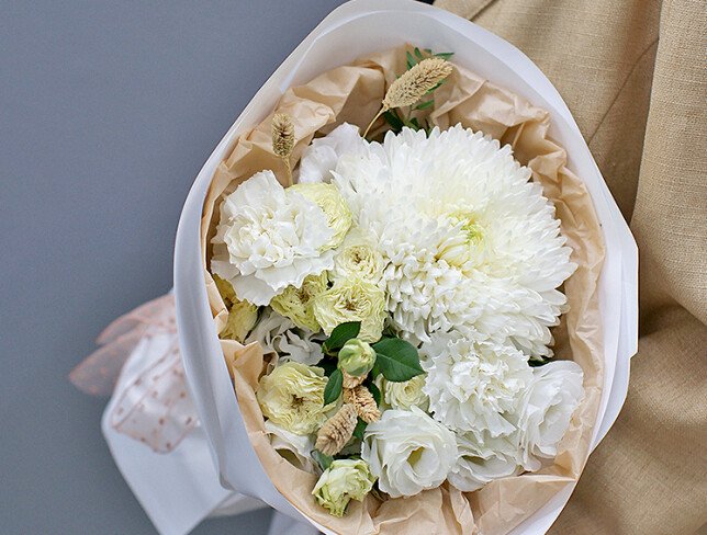 Bouquet of white spray roses, eustoma and pompon chrysanthemum photo