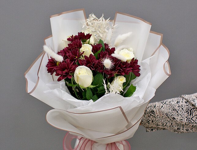 Bouquet of white roses and burgundy chrysanthemums photo