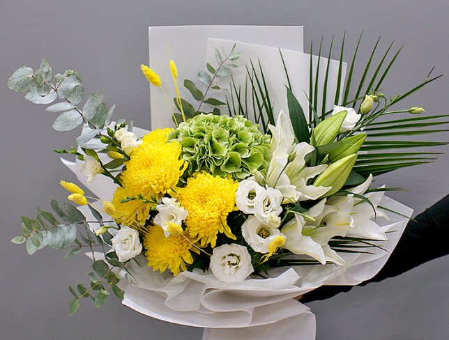 Bouquet of green hydrangea, lilies and yellow chrysanthemums photo