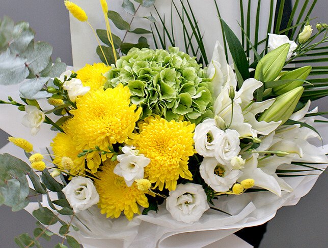 Bouquet of green hydrangea, lilies and yellow chrysanthemums photo