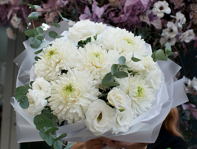 Bouquet with white spherical chrysanthemums and eustomas photo