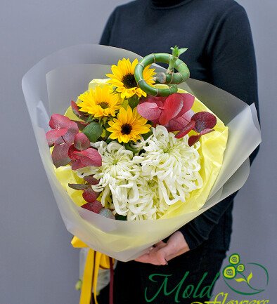 Bouquet of sunflowers, white chrysanthemums and bamboo