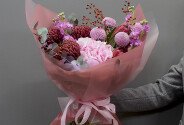 Bouquet of pink hydrangea, protea, and chrysanthemums — photo 1